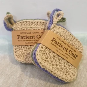 Patient-Calf-Branded-Handmade-Skincare-Packaging. Two stacks of handmade cotton face scrubbies by Patient Calf packaged with "Handmade For You" and "Made in Canada" brown paper bands.