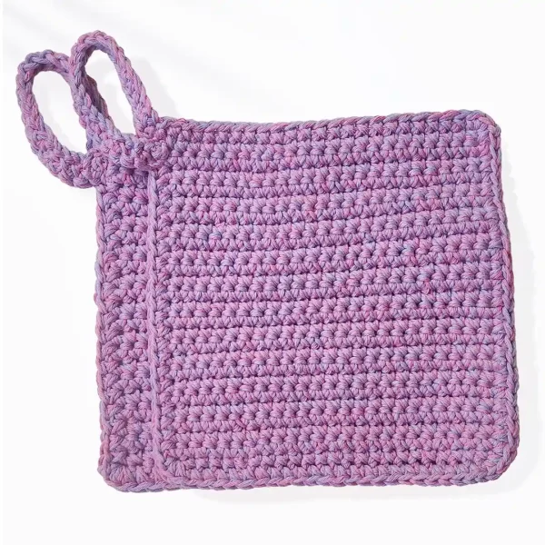 Two Loire washcloths in Sweet Rose and Soft Lilac multi-color stacked to show the thickness and quality of the Patient Calf crochet stitches
