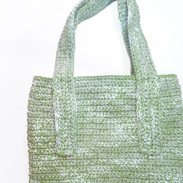 Close-up of the Rowan Tote straps and the clean, artisan finish of the Sage Green crochet.