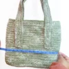 The Rowan Tote by Patient Calf in Sage Green and Parchment, showing a 14-inch width with a measuring tape.