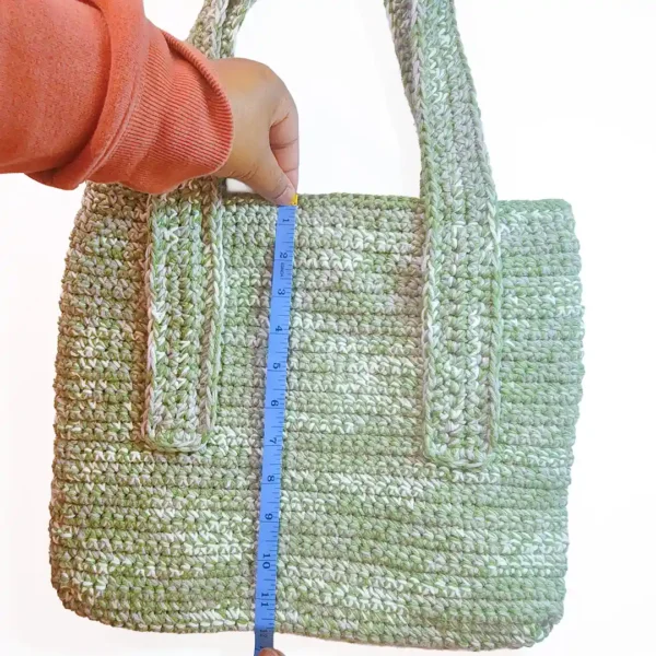Measuring the 12-inch height of the Rowan Tote, highlighting the sturdy, structured construction.