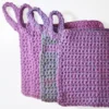 A fanned-out arrangement of Loire washcloths in Sweet Rose and multi-colored variations