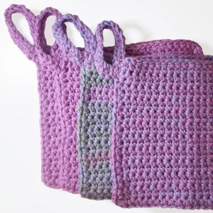 A fanned-out arrangement of Loire washcloths in Sweet Rose and multi-colored variations